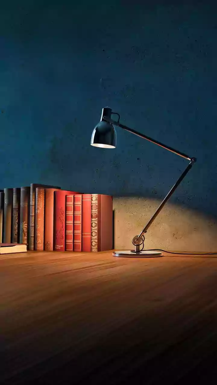 A Small Desk Needs Flexible Light That Moves with the Task