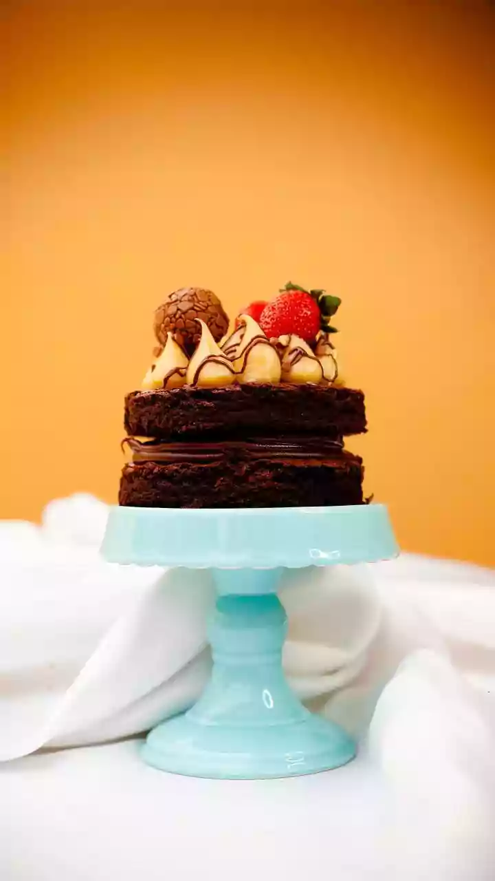 DIY Cake Stand Magic: Nauheed Cyrusi's Clever Kitchen Hack for Effortless Entertaining