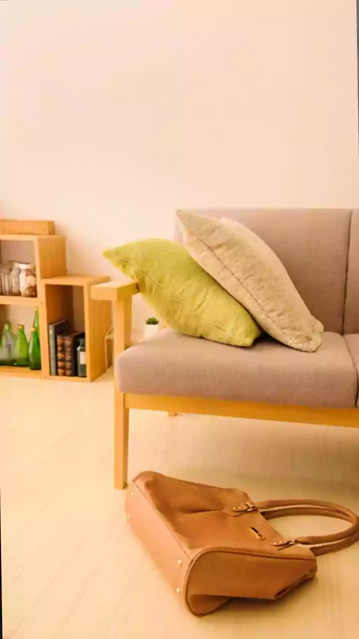 How Repurposing Scrap Linen Into Elegant Napkins And Throws Adds Style To Living Room Space
