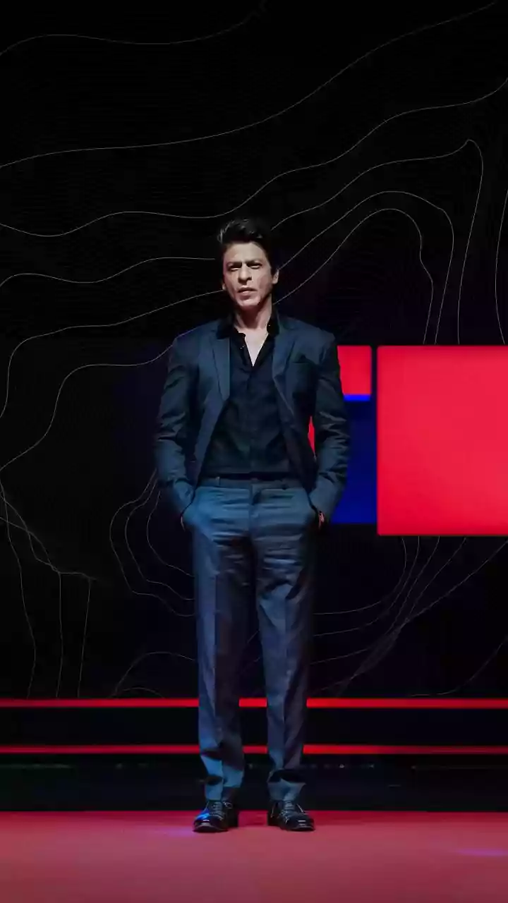 SRK's Regal Style: The Enduring Charm of a Black Suit