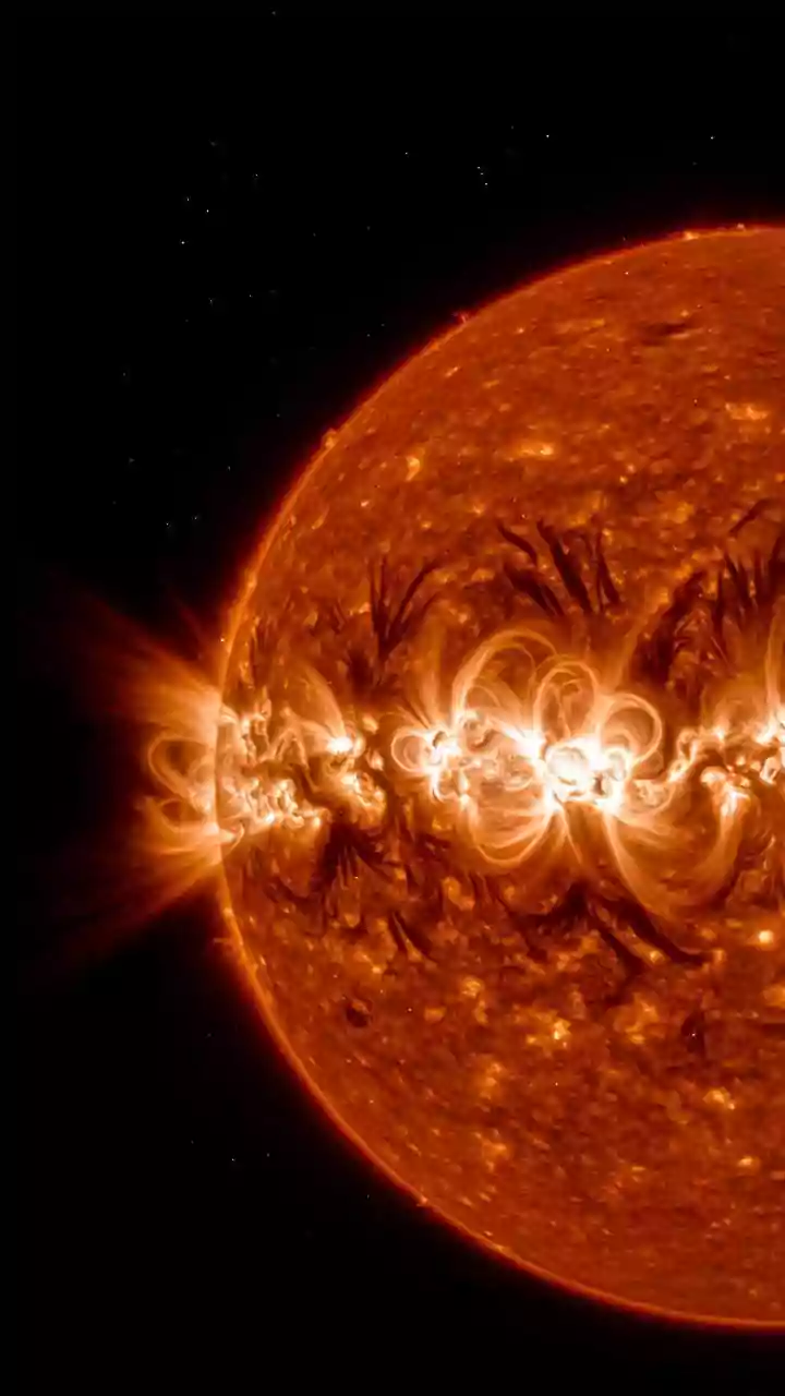 Coalescing magnetic ropes explain mysterious solar nanojets