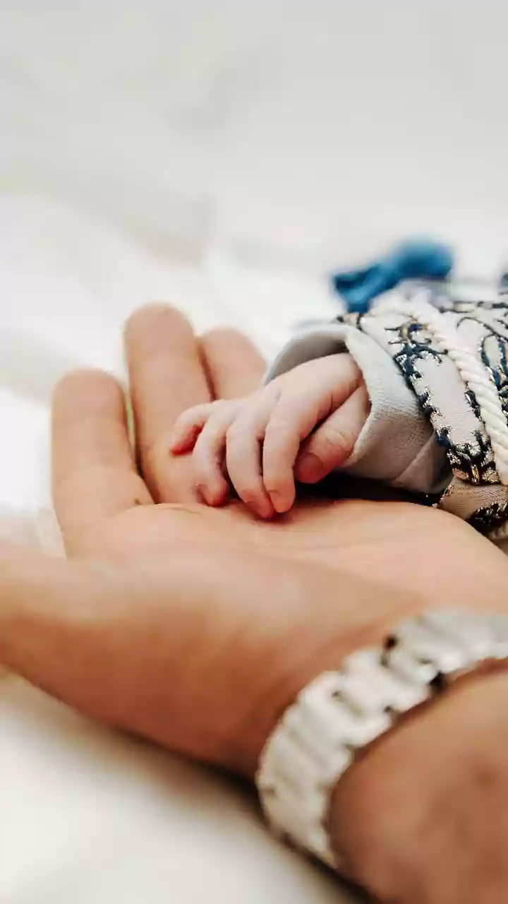 A Century Apart: 104-Year-Old Great-Grandmother's Tender Moment with 4-Month-Old Grandson