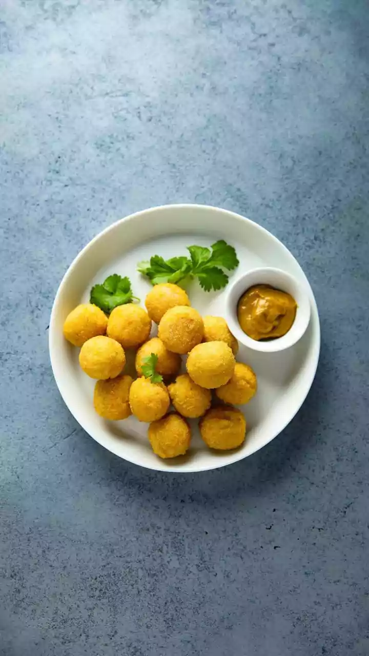 National Potato Day 2026 Contrasts Gentle Posto With Mumbai's Crisp Batata Vada