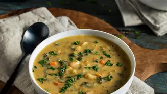 Zero-waste kitchen cooking turning vegetable peels herb stems and stale bread into flavorful soups