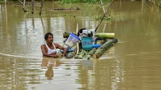 Monsoon floods: 22,000 evacuated in Gujarat, Assam toll rises to 47, Jhelum crosses alert mark