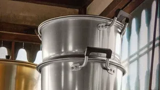 Deep Kitchen Drawers Can Store Pots More Accessibly than Low Fixed Shelves