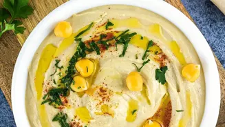 Dip Into Zesty Lemon Hummus For Protein-Packed Healthy Snack Served With Pita