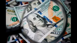Dólar cai forte com alívio do preço do petróleo, abaixo de US$ 80