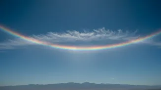NASA's New Fire Rainbow Picture: Skywatchers Can Compare Ice Crystals and the Sun's Angle before Calling the Bright Arc Fire