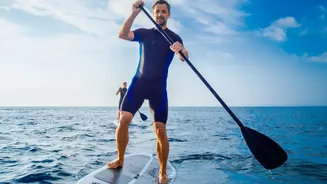 How Kayaking And Paddleboarding Differ In Seated Paddling Versus Standing Balance