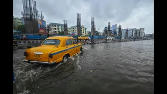 West Bengal Sees Contrasting Weather: Floods in North, Heatwave in South