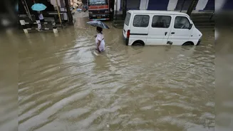 Monsoon Fury Ahead: IMD Warns of Extremely Heavy Rain in 14 States; South India Faces Sticky Heat