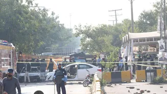 Pakistan blames Taliban, India for suicide bombing that killed 12