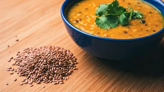 Boost Daily Heart Health Scooping Crushed Flaxseeds In Dal Dishes