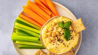 How Freshly Squeezed Lemon Elevates Dip Platters Featuring Creamy Homemade Chickpea Hummus