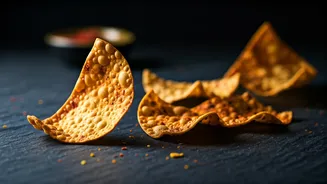 Gourmet Masala Papad Chips Dominate New Textured Snackification Trends