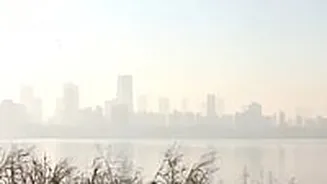 Mumbai Weather Update For Dec 9, 2025: City Wakes Up To Sunny Skies With Thin Layer Of Smog; AQI Improves Marginally From Unhealthy To Poor At 139