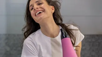 How To Dry Rain-Soaked Hair Without Adding Unnecessary Damage