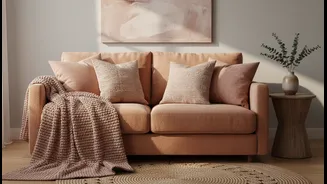 Dusty Rose Adds Personality to Sandstone Through Cushions and Throws