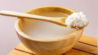 Ancient fermented rice water solutions inspire wellness creators seeking natural hair and gut remedies