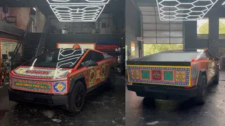Tesla Cybertruck stainless steel covered with Indian truck art wrap