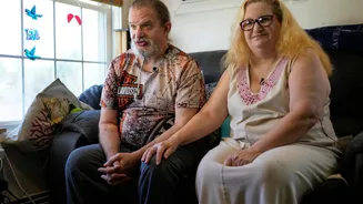 Robot Assists Ailing Couple in Daily Life Amid Aging Population Challenges