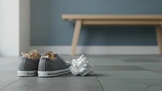 Change Damp Paper as Shoes Continue to Dry