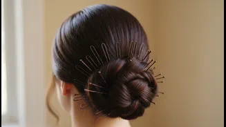 Matching Bobby Pins Keep the Low Bun Hardware Visually Seamless