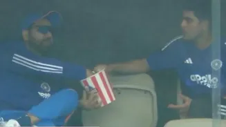 Rohit, Gill unwind with popcorn during Perth rain