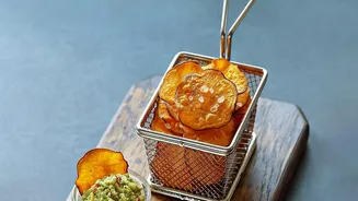 Air fried nadru chips emerge as popular low calorie options in modern urban cafes
