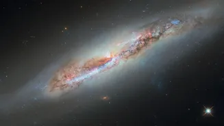Hubble captures galaxy being stripped of gas