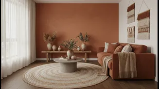 Urban renters transform modern apartment interiors using warm earthen terracotta tones