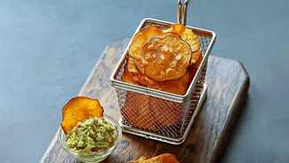 Air fried lotus stem chips offer light crispy regional flavors without heavy oil content