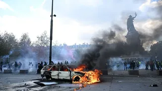 Tear Gas, Burning Buildings, Street Clashes: France’s Protests Turn Violent Again