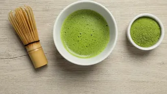 Dirty matcha combines matcha with an espresso shot Puts The drink layers tea bitterness coffee intensity and milk In Focus