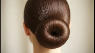 A Smooth Base Gives the Low Bun a Sharper, More Polished Finish