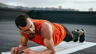 Building Core Endurance: How Alternating Plank Movements Protect Your Spine During Workouts