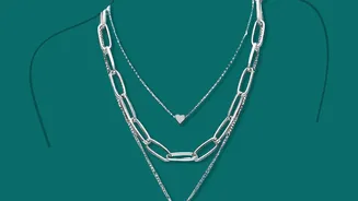 Practical Hacks For Layering Delicate Necklaces To Build Unique Bold Statement Pieces