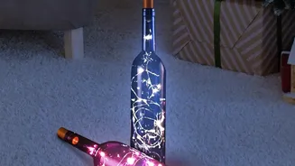 How to combine old glass bottles with LED fairy lights for instant upcycled room decor