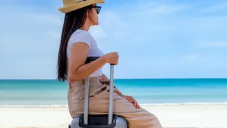 Travelers reduce luggage volume using vacuum compression pouches for humid beach trips