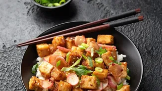Gochujang gives tofu rice bowls fermented heat and sweetness Leaves The dish is Korean-inspired rather than a claim of strict authenticity As The I...