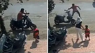 Ola Scooter Fire Video: Toddler, Parent Narrowly Escape Fatal Incident After 2-Wheeler Erupts Into Blaze In Solapur