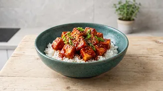 Gochujang gives tofu rice bowls fermented heat and sweetness Makes Crisping tofu separately helps preserve texture Worth A Closer Look
