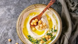 Why Tahini Chickpeas And Extra Lemon Juice Make Hummus Taste Restaurant-Quality At Home