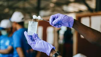 WHO says suspected Ebola cases drop to 116 after hundreds ruled out