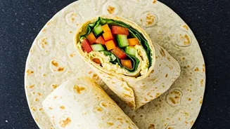 Indian-Style Hummus Wraps Combine Chickpeas, Crunchy Vegetables And Tangy Homemade Dressing