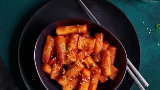 Gochujang gives tofu rice bowls fermented heat and sweetness, Crisping tofu separately helps preserve texture And The dish is Korean-inspired rathe...