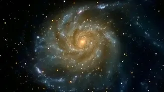 Alaknanda Shows That Grand-Design Spirals May Have Formed Earlier Than Thought