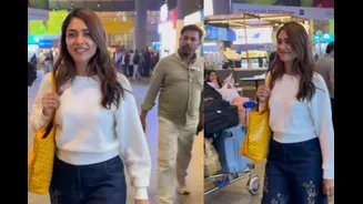 Mrunal Thakur Makes Airport Fashion Effortlessly Chic In White Pullover And Jeans