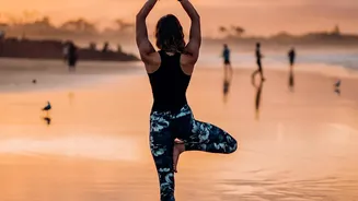 Aqua Yoga In Shallow Water Differs From Stand-Up Paddleboarding